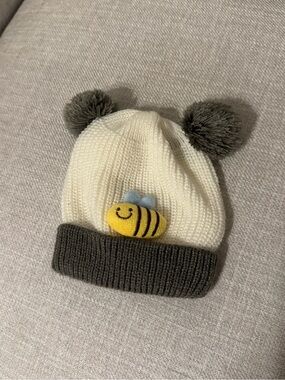 Cream Knit Beanie with Gray Pom Poms and Yellow Bee Accent